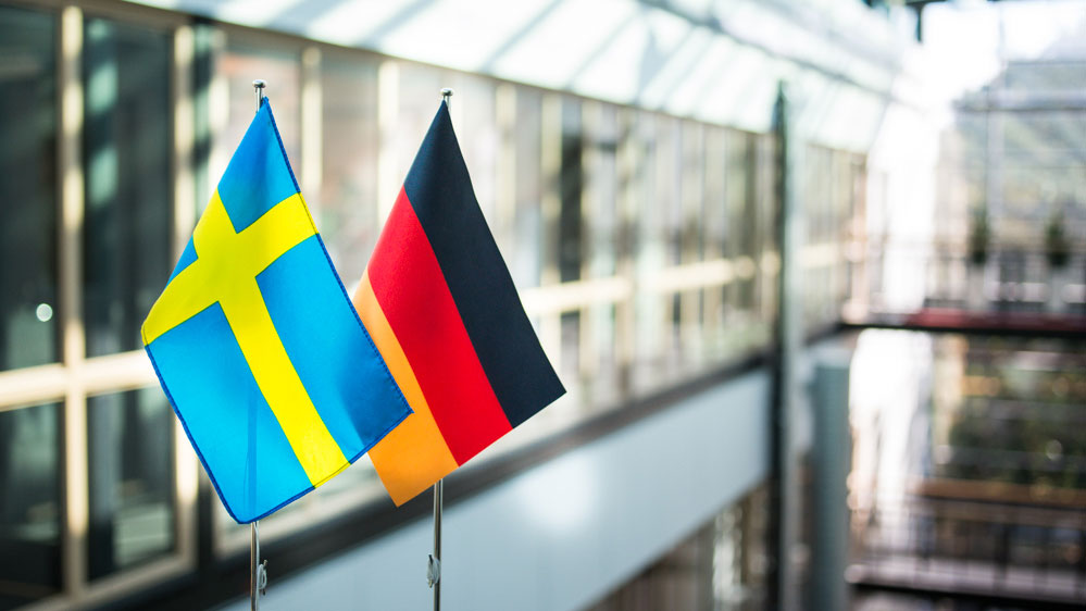 The Swedish and the German flag. Photo.